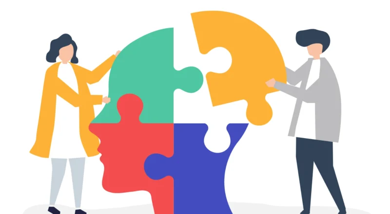 Ilustração de duas pessoas montando uma cabeça humana com um quebra-cabeça colorido, simbolizando como slogans simples moldam comportamentos.