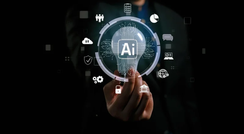 Imagem ilustrativa de AI Overviews, mostrando uma lâmpada com o símbolo Ai e ícones tecnológicos, destacando inovação e inteligência artificial.